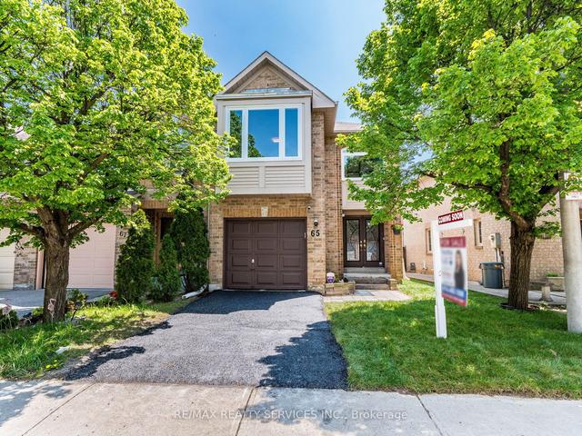 65 Gilgorm Rd, Townhouse with 3 bedrooms, 3 bathrooms and 2 parking in Brampton ON | Image 1