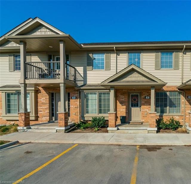 92 - 3320 Meadowgate Blvd, House attached with 2 bedrooms, 1 bathrooms and null parking in London ON | Image 1