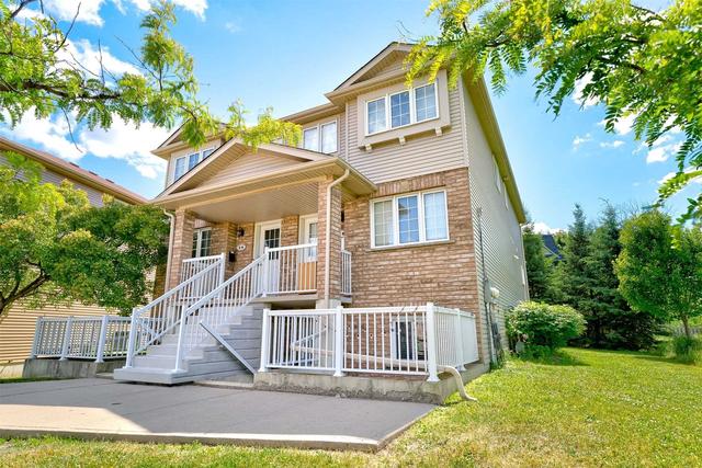 8D - 50 Howe Dr, Condo with 1 bedrooms, 1 bathrooms and 1 parking in Kitchener ON | Image 1