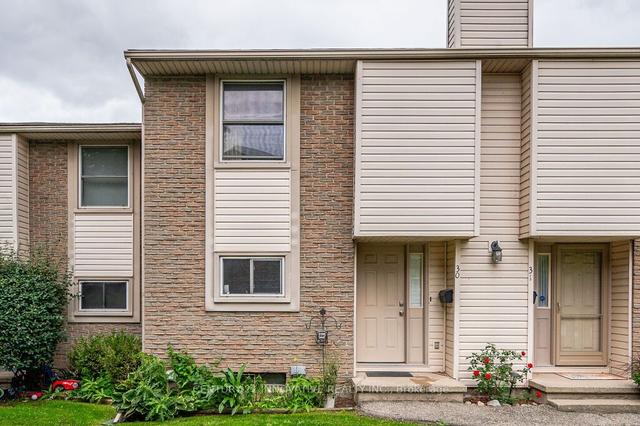 30 - 11 Grand River Blvd, Townhouse with 3 bedrooms, 2 bathrooms and 1 parking in Kitchener ON | Image 1