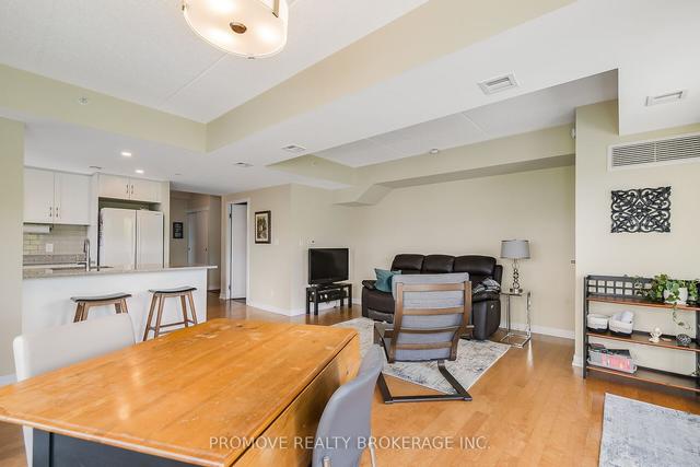 500 - 5 Gordon St, Condo with 2 bedrooms, 1 bathrooms and 1 parking in Guelph ON | Image 4