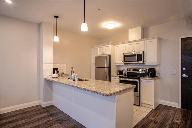 919 - 118 King St E, Condo with 1 bedrooms, 1 bathrooms and 1 parking in Hamilton ON | Image 5