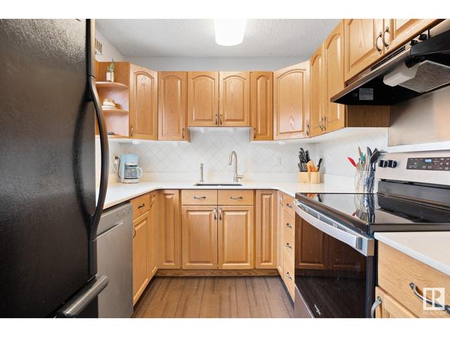 10790 31 Av Nw Nw, House attached with 3 bedrooms, 1 bathrooms and null parking in Edmonton AB | Image 14