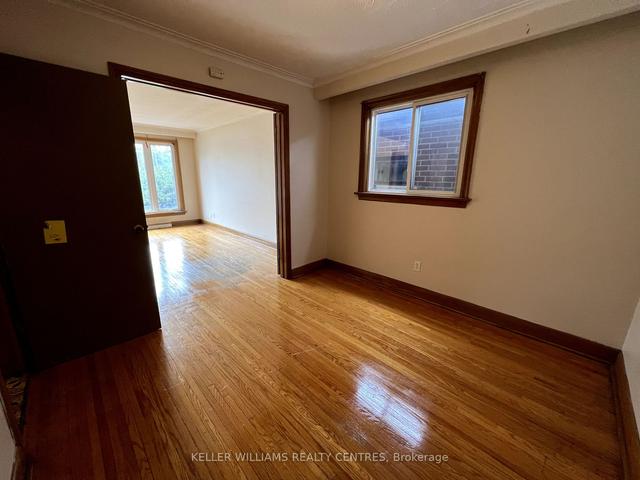 MAIN - 23 Redhill Ave, House detached with 2 bedrooms, 1 bathrooms and 2 parking in York ON | Image 11