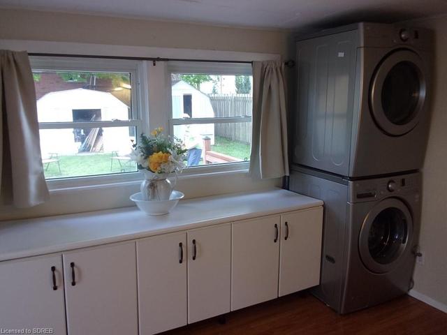 34 - Entrance from side deck to laundry area - mud room | Image 34