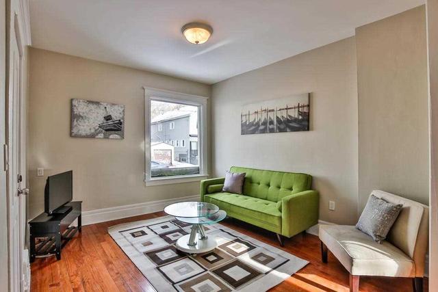 MAIN - 1435 Dundas St E, House attached with 2 bedrooms, 2 bathrooms and 1 parking in Toronto ON | Image 1