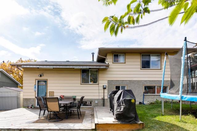 1410 Hunterbrook Rd Nw, House detached with 4 bedrooms, 1 bathrooms and 2 parking in Calgary AB | Image 48
