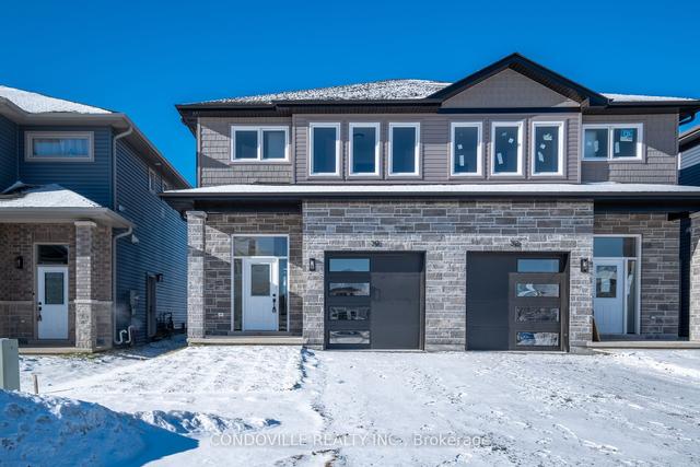 22 Dusenbury Dr, House semidetached with 3 bedrooms, 3 bathrooms and 2 parking in South Frontenac ON | Image 1