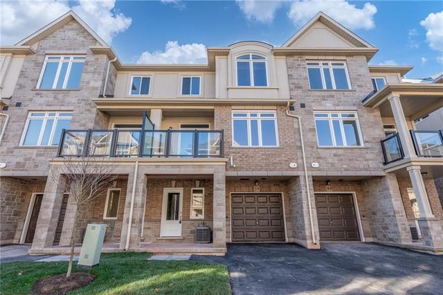 39 - 40 Zinfandel Dr, House attached with 2 bedrooms, 1 bathrooms and 1 parking in Stoney Creek ON | Image 1