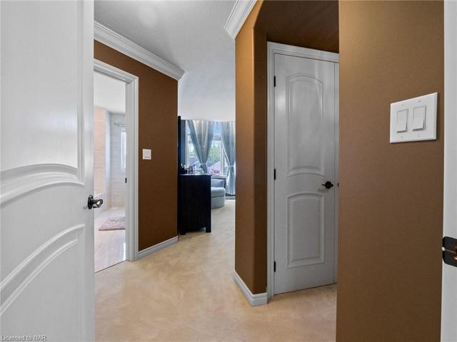 Atop the 2nd floor lies the exquisite primary bedroom with TWO ensuites and TWO walk-in closets. | Image 11