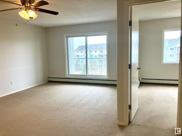 414 - 70 Woodsmere Cl, Condo with 2 bedrooms, 2 bathrooms and 1 parking in Fort Saskatchewan AB | Image 10