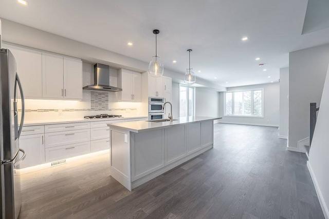 MAIN - 3511 St Clair Ave E, House semidetached with 4 bedrooms, 3 bathrooms and 1 parking in Scarborough ON | Image 3
