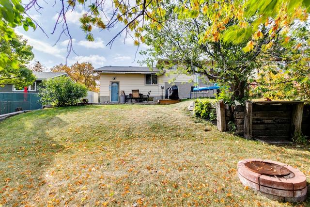 1410 Hunterbrook Rd Nw, House detached with 4 bedrooms, 1 bathrooms and 2 parking in Calgary AB | Image 46