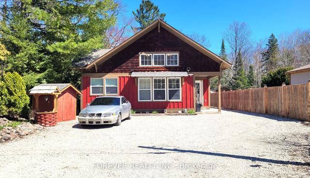 41 Tripp Ln, House detached with 2 bedrooms, 1 bathrooms and 9 parking in Tiny ON | Image 1