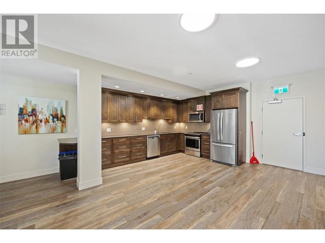 310 - 3865 Truswell Rd, Condo with 2 bedrooms, 2 bathrooms and 1 parking in Kelowna BC | Image 42