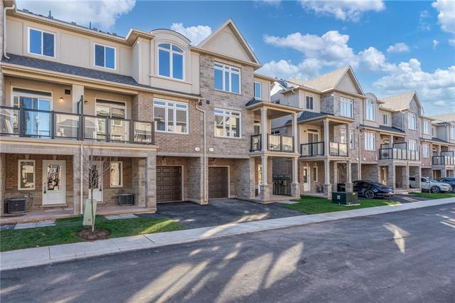 39 - 40 Zinfandel Dr, House attached with 2 bedrooms, 1 bathrooms and 1 parking in Stoney Creek ON | Image 2