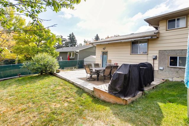 1410 Hunterbrook Rd Nw, House detached with 4 bedrooms, 1 bathrooms and 2 parking in Calgary AB | Image 45