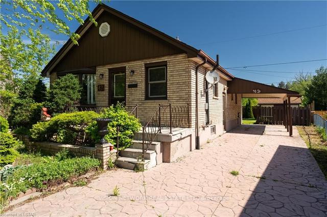 42 Cronyn Cres, House detached with 2 bedrooms, 2 bathrooms and 3 parking in London ON | Image 1