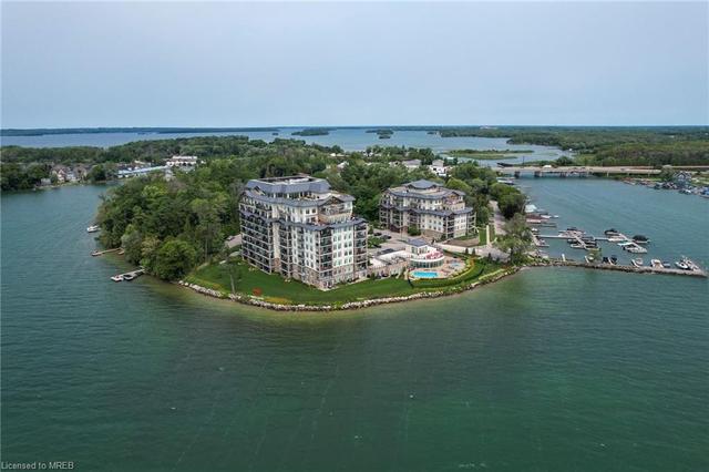303 - 90 Orchard Point Road Rd, House attached with 2 bedrooms, 2 bathrooms and 1 parking in Orillia ON | Image 1