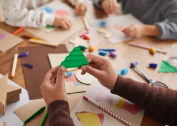 Kids making crafts together at a table