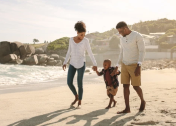 A family walking on the beach
