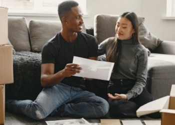 couple talking and looking at documents