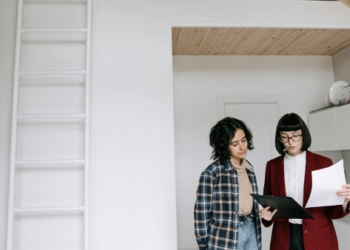 Real estate agent chatting with client