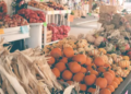 Fall market with fruits and vegetables for sale.