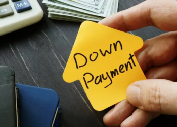 A house shaped sticky note that says down payment.