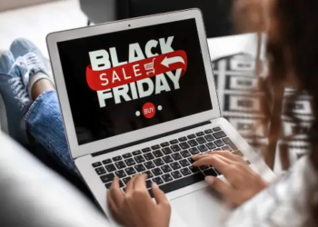 A laptop that displays "Black Friday Sales".