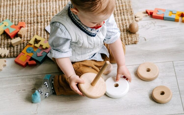 baby playing on floor