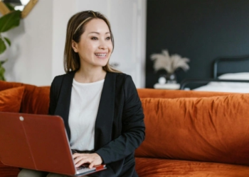 woman on her laptop at home