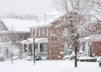 A snowy neighborhood of homes