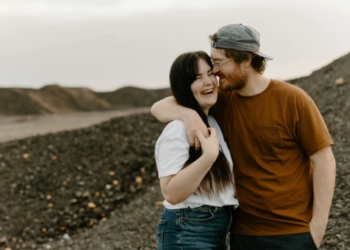 couple hugging on a hike